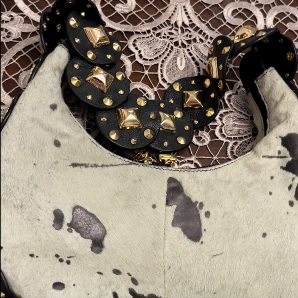 Lucky charm shoulder bag excellent condition with fox fur and studs